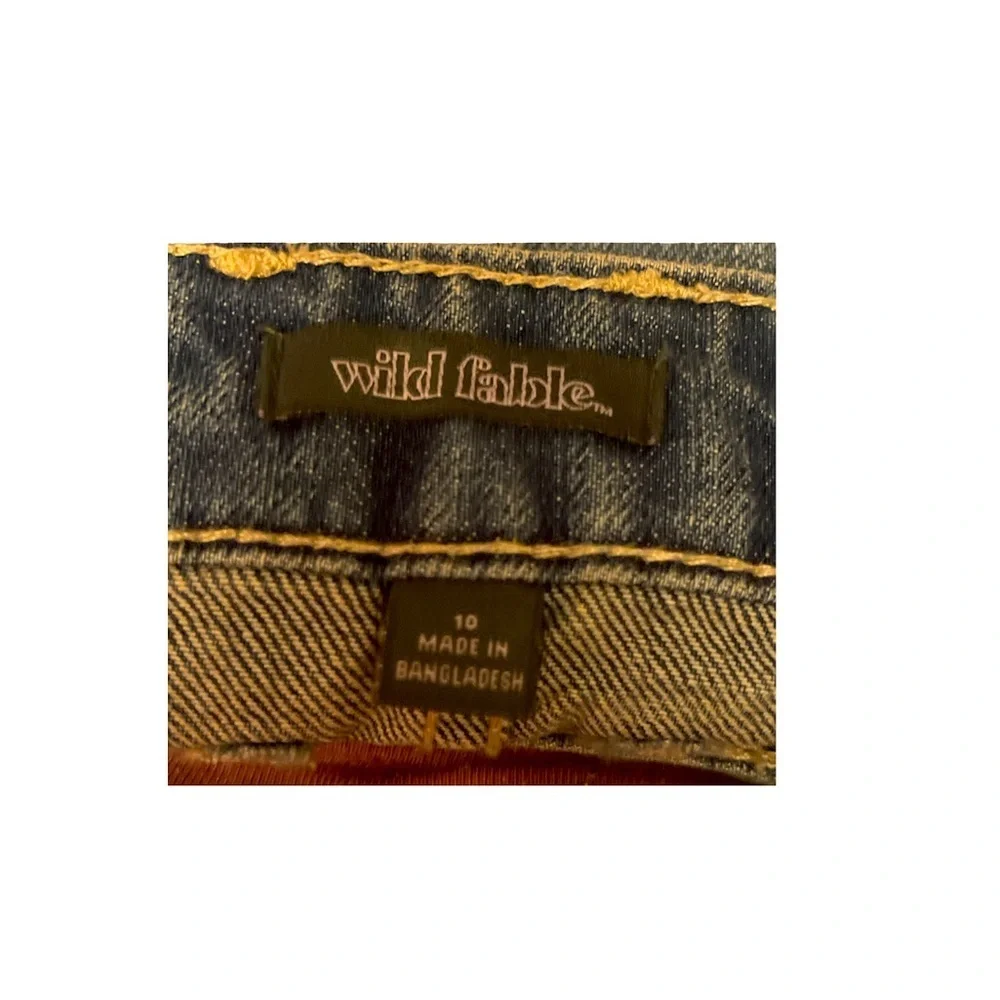 BNWT- Mini denim skirt w/ cute patches.